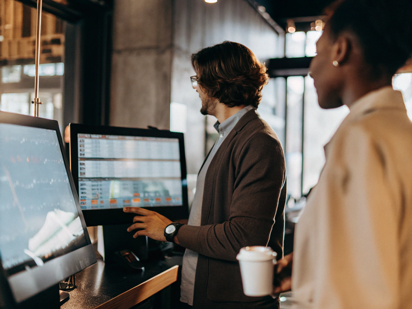 Customer receiving smart recommendations while staff monitor AI chatbot, pricing, and forecasting in center